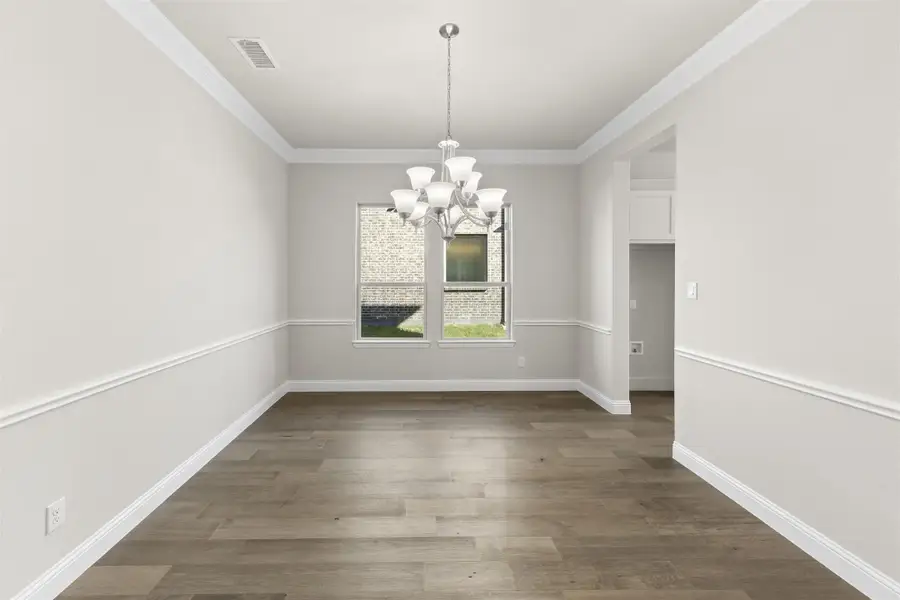 Representative unfurnished interior of a home built from the Portsmouth by Windsor Homes in Nelson Lake Estates, Rockwall (Image 18).