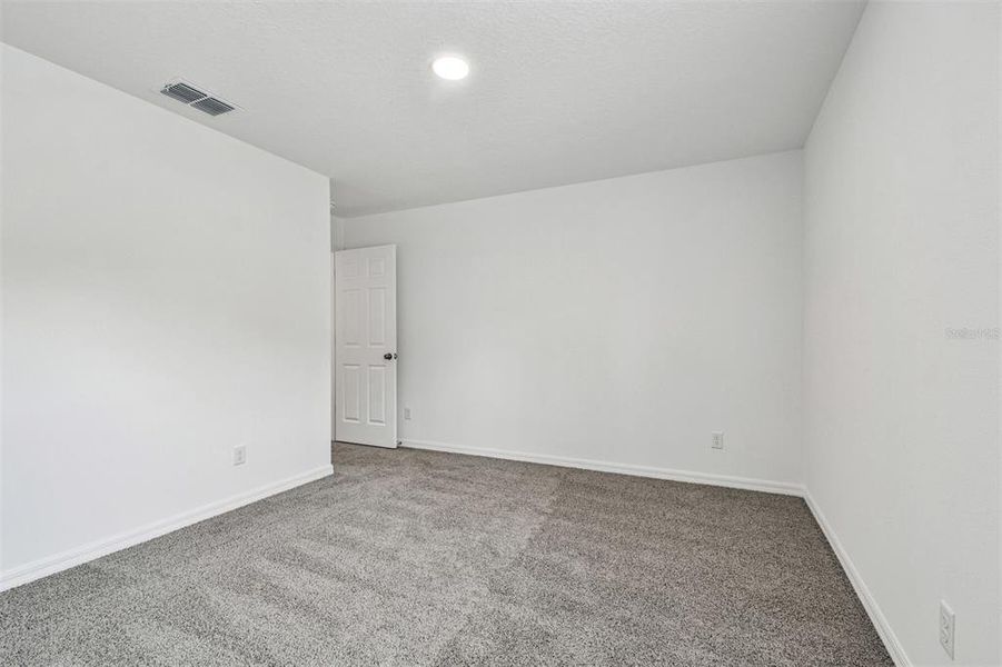 Spacious, unfurnished interior of a new home in Meadow Oaks, Hudson (Image 22).