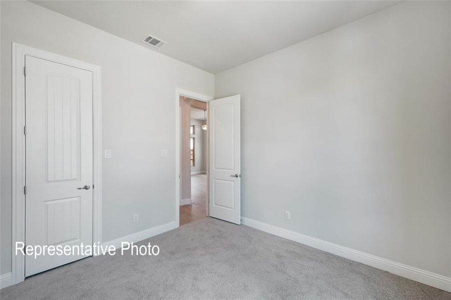 Unfurnished bedroom featuring carpet flooring