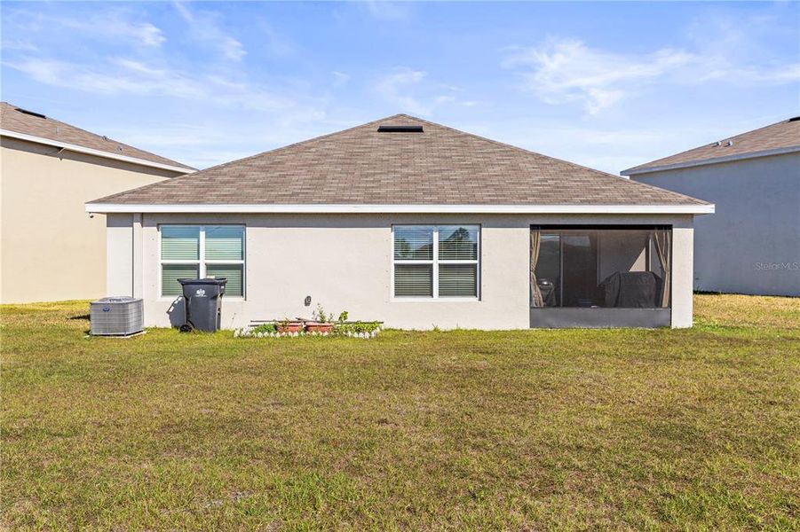 Front exterior of a new home in Berry Bay, Wimauma, FL, highlighting curb appeal (Image 20). Front exterior of a new home in Berry Bay, Wimauma, FL, highlighting curb appeal (Image 20).