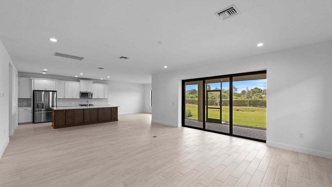 Spacious, unfurnished interior of a new home in SkySail, Naples (Image 19).