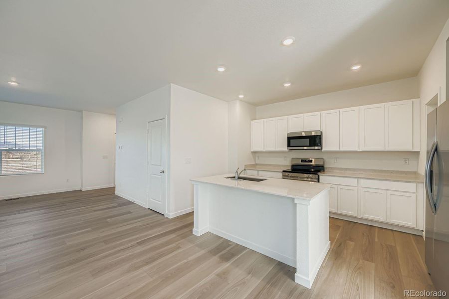 Furnished interior view inside a new home in , Thornton (Image 7).