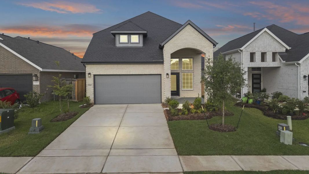 Representative exterior photo of a completed home built from the Durango by Chesmar Homes in Emory Glen, Katy, TX (Image 1). Representative exterior photo of a completed home built from the Durango by Chesmar Homes in Emory Glen, Katy, TX (Image 1).