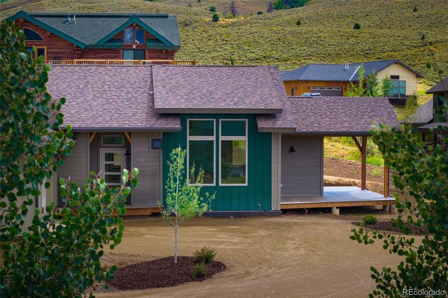 Front exterior of a new home in , Hot Sulphur Springs, CO, highlighting curb appeal (Image 17).