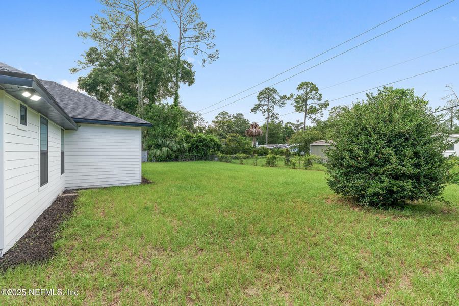 Front exterior of a new home in , Gainesville, FL, highlighting curb appeal (Image 32).