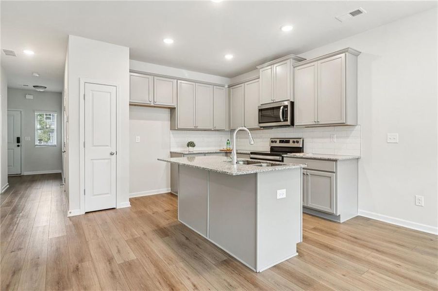 Furnished interior view inside a new home in Cambridge at Towne Center, Hoschton (Image 5).