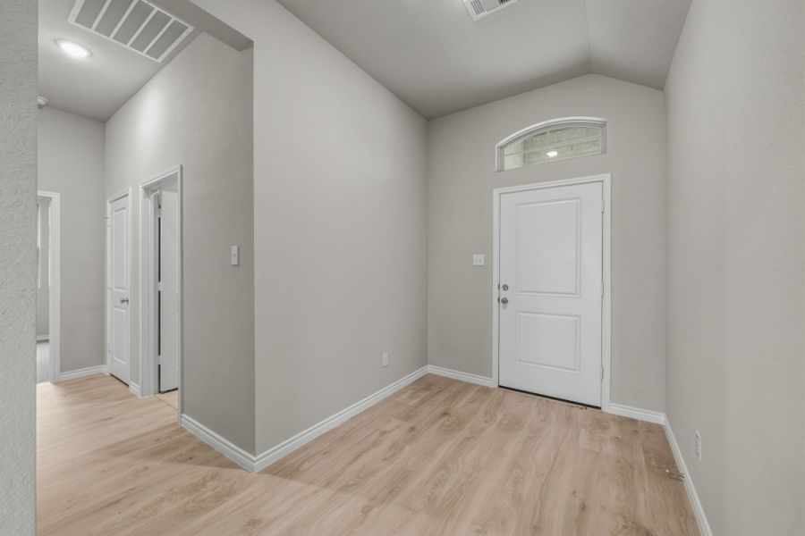 Entry in the Cedar home plan by Trophy Signature Homes – REPRESENTATIVE PHOTO Entry in the Cedar home plan by Trophy Signature Homes – REPRESENTATIVE PHOTO