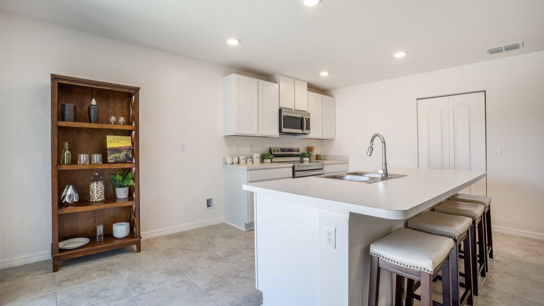Representative furnished interior of a home built from the Orchid by Maronda Homes in Coastal Communities, Edgewater (Image 27).