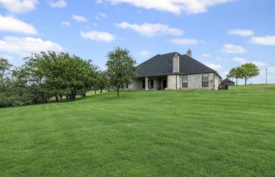 Exterior details and patio area of a home in , Weatherford (Image 26).