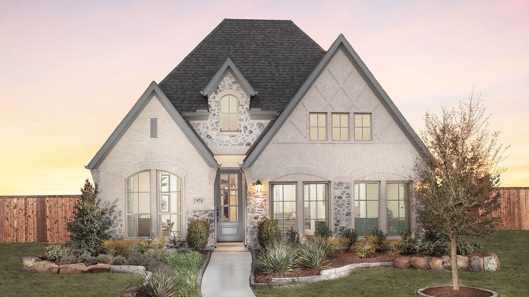 Front exterior of a new home in Lariat 45', Liberty Hill, TX, highlighting curb appeal (Image 2).