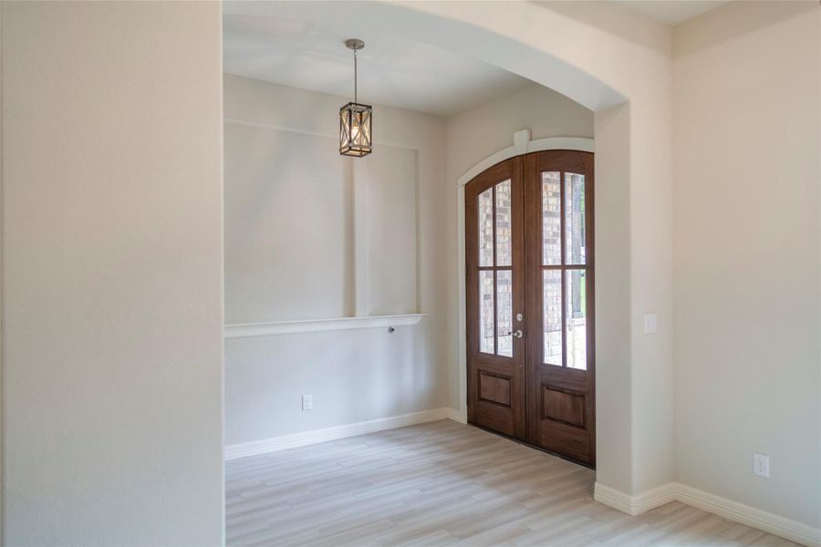 SAMPLE PICS Study comes off the formal front foyer.