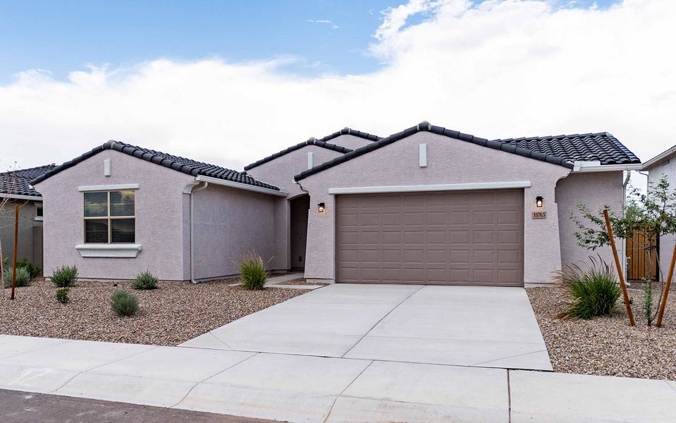Front exterior of a new home in Rancho Mirage, Maricopa, AZ, highlighting curb appeal (Image 2).