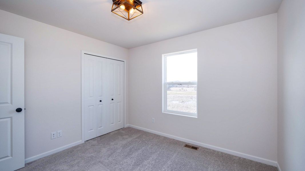 Representative unfurnished interior of a home built from the The Kettering by Norfolk Homes in Preserve at Magnolia Park, Jackson (Image 44).