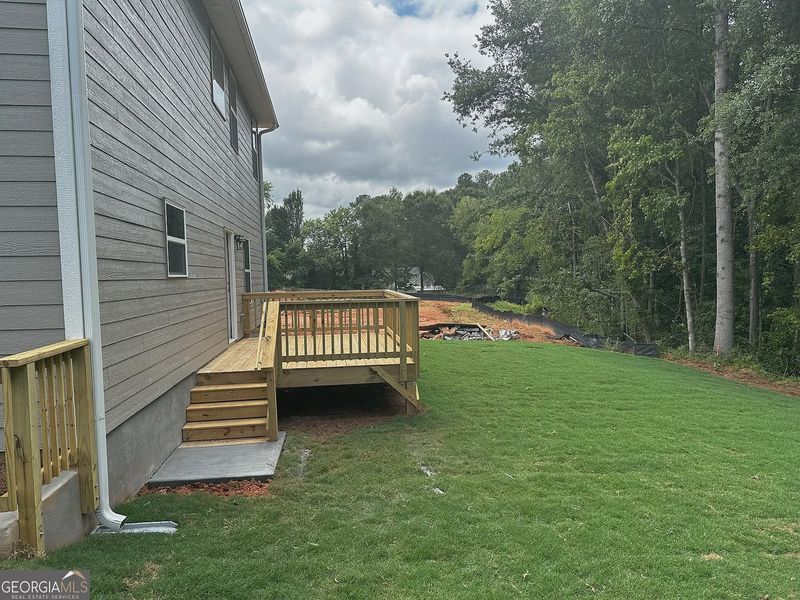 Front exterior of a new home in Canterbury Villas, Carrollton, GA, highlighting curb appeal (Image 13).