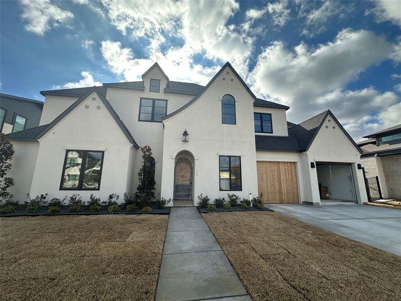 Front exterior of a new home in , Grapevine, TX, highlighting curb appeal (Image 4).