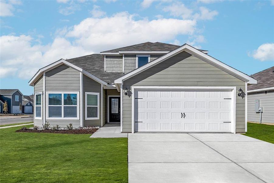 View of front of home featuring a front lawn