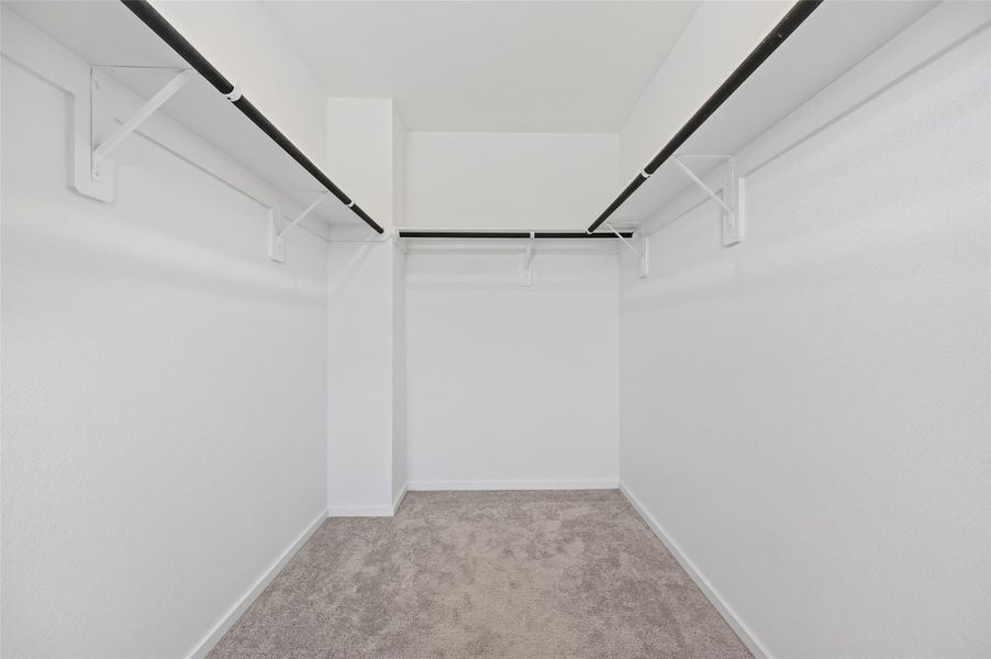 Walk in closet in the master bedroom. Walk in closet in the master bedroom.