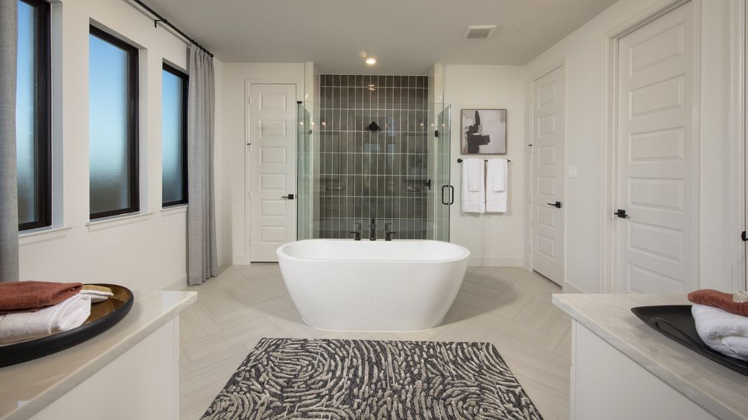 Representative furnished interior of a home built from the 3484M by Perry Homes in Lakes of Cane Island, Katy (Image 10).