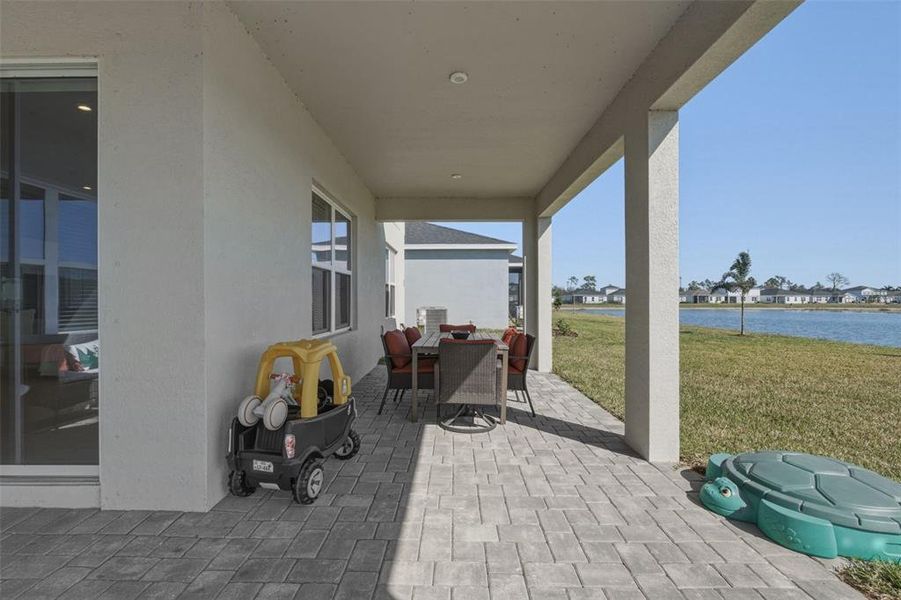Exterior details and patio area of a home in West Port Single Family Homes, Port Charlotte (Image 19).