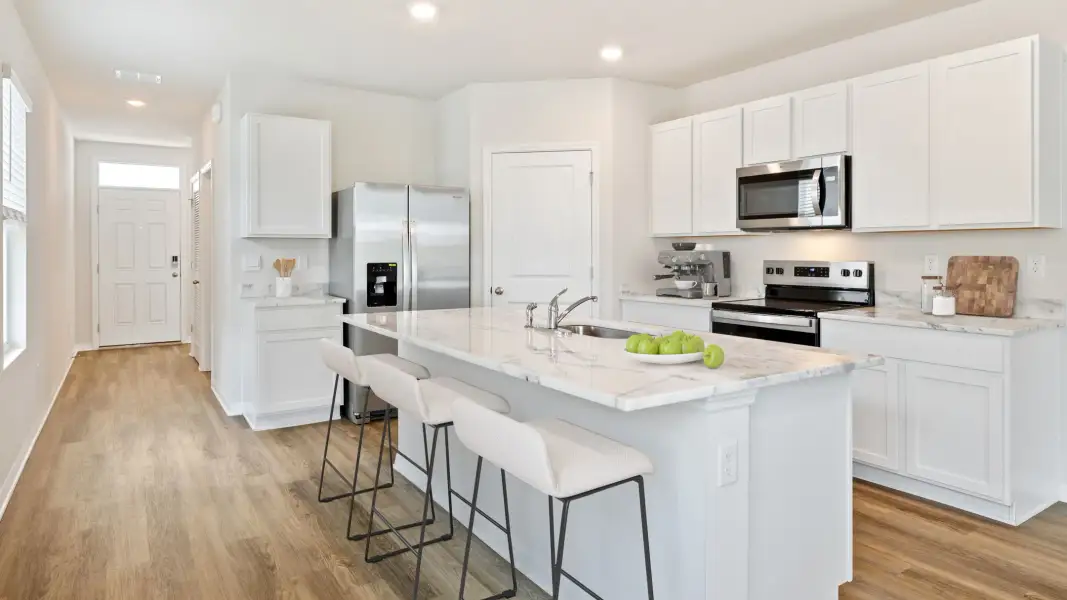Furnished interior view inside a new home in Pinellas County Spot Lots, St. Petersburg (Image 3).
