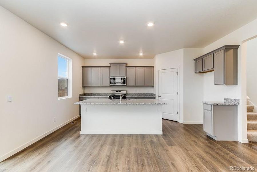 Furnished interior view inside a new home in Sky Ranch, Watkins (Image 11).