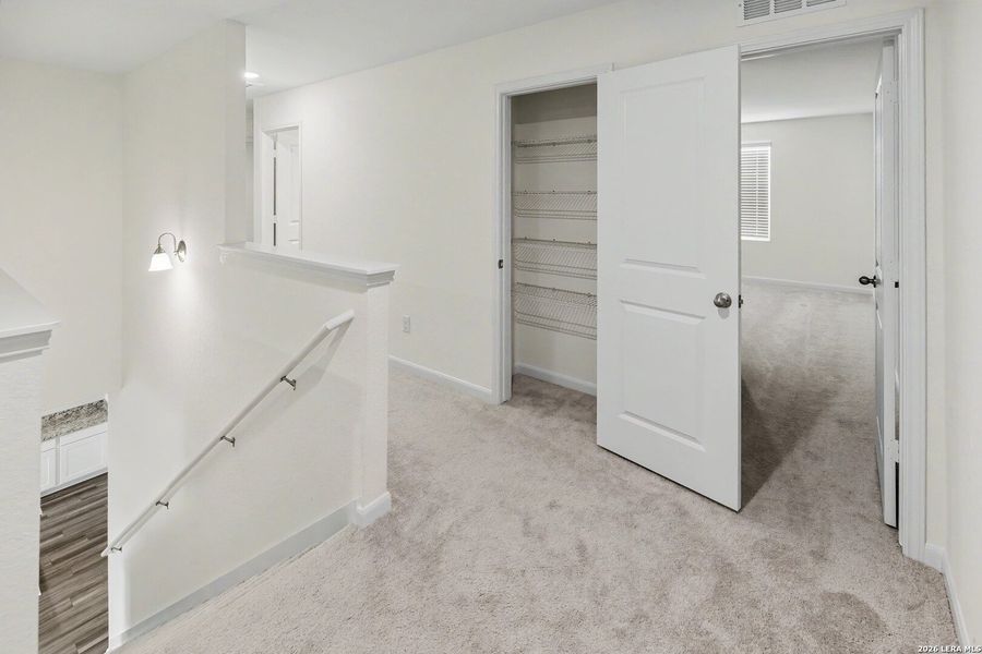 Spacious, unfurnished interior of a new home in Hennersby Hollow, San Antonio (Image 26).