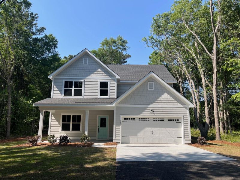 Front exterior of a new home in , Charleston, SC, highlighting curb appeal (Image 19).