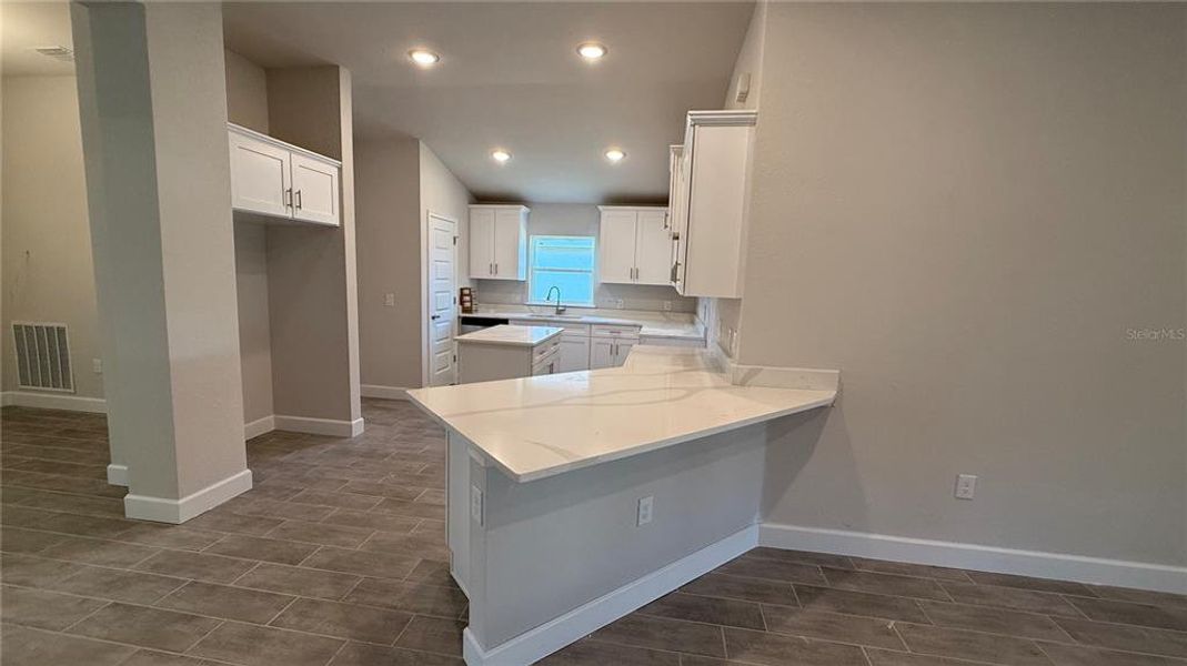 Furnished interior view inside a new home in Watercress Cove, North Port (Image 4).