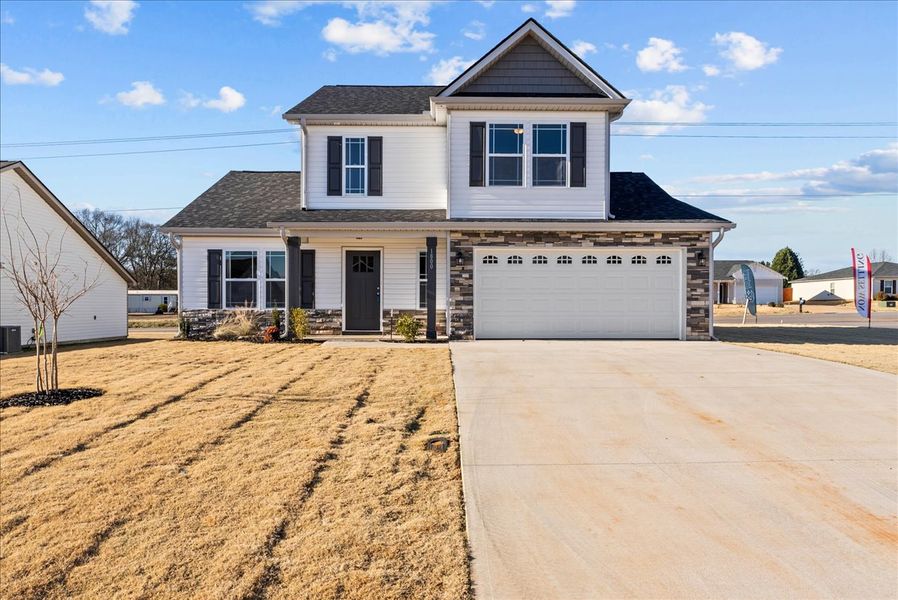 Representative exterior photo of a completed home built from the Sumter by Enchanted Homes in Ballentine Ridge, Lyman, SC (Image 2).