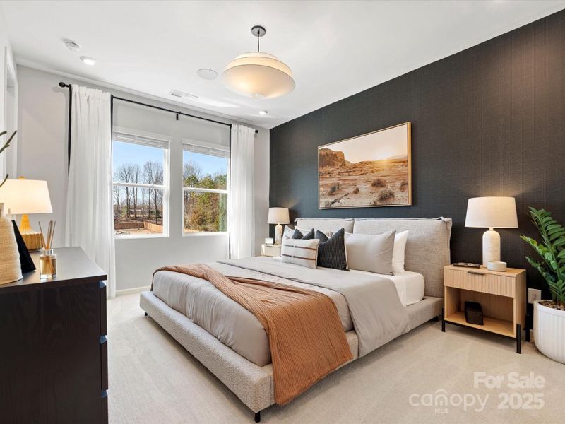 Primary Suite Featuring Large Energy Efficient Windows.