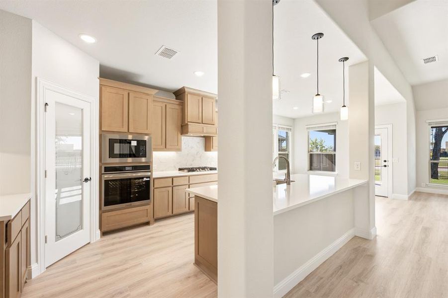 Furnished interior view inside a new home in Ridge Ranch Classic 60, Mesquite (Image 12).