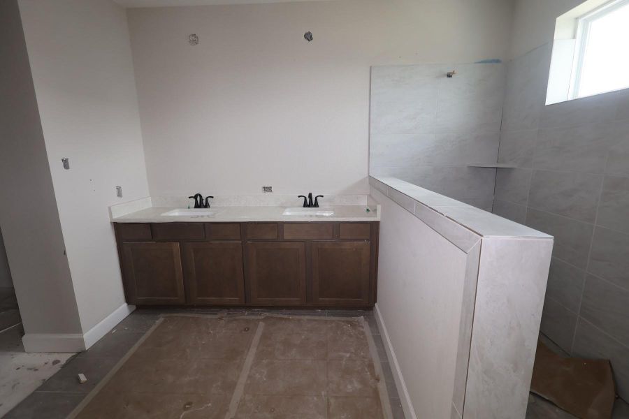 In-progress construction of a new home in Pomona - Grove Row Collection, Manvel, TX (Image 4).
