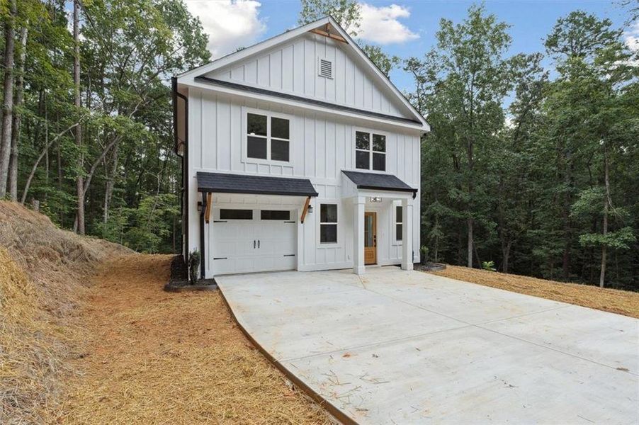 Front exterior of a new home in , Gainesville, GA, highlighting curb appeal (Image 2).