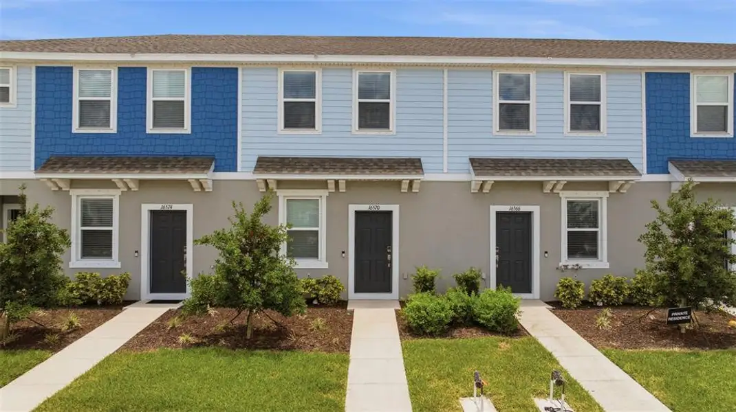 Front exterior of a new home in , Bradenton, FL, highlighting curb appeal (Image 1). Front exterior of a new home in , Bradenton, FL, highlighting curb appeal (Image 1).