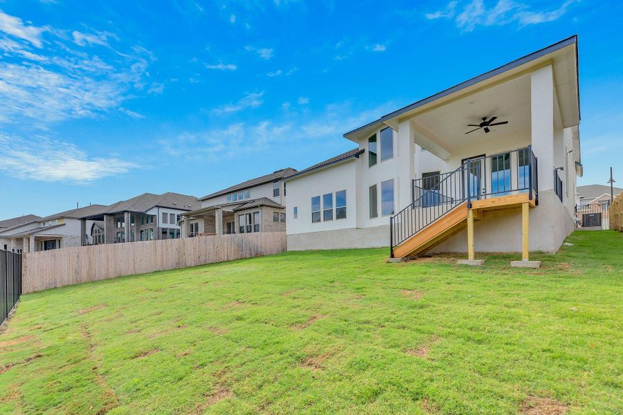 Exterior details and patio area of a home in Santa Rita Ranch, Liberty Hill (Image 31). Exterior details and patio area of a home in Santa Rita Ranch, Liberty Hill (Image 31).