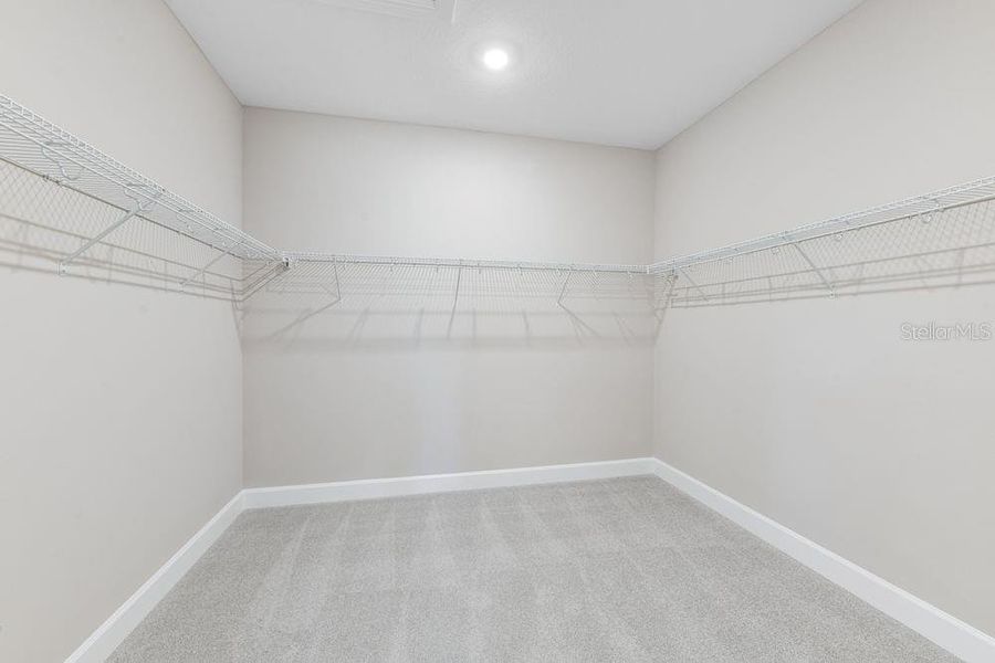 Spacious, unfurnished interior of a new home in Esplanade at Skye Ranch, Sarasota (Image 23).