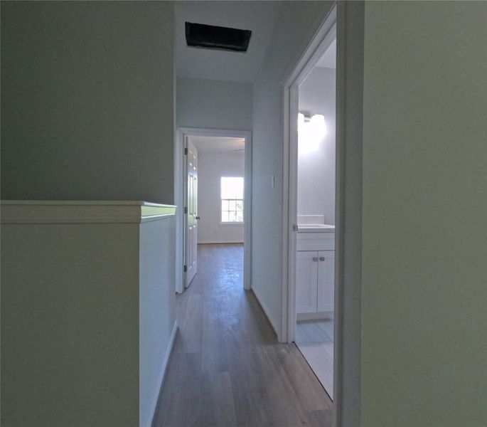 Hallway leading to secondary rooms