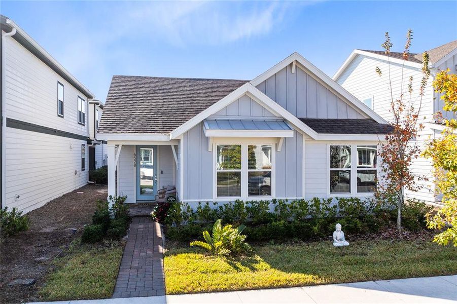 Front exterior of a new home in Weslyn Park, St. Cloud, FL, highlighting curb appeal (Image 2). Front exterior of a new home in Weslyn Park, St. Cloud, FL, highlighting curb appeal (Image 2).