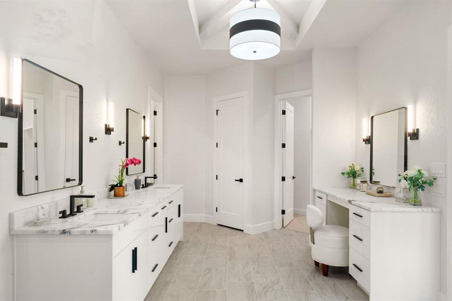 Bathroom featuring double vanity