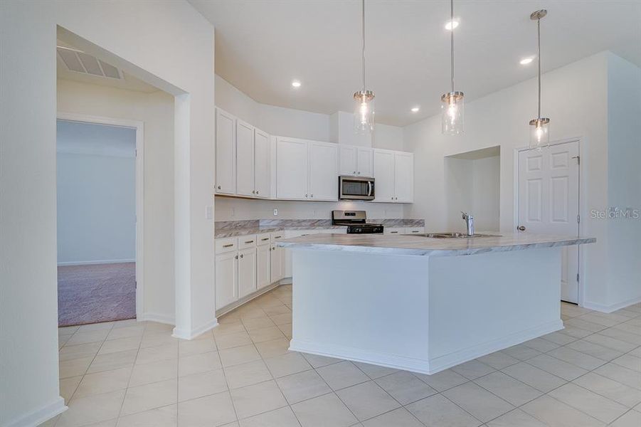 Furnished interior view inside a new home in Somerset - Executive Series, Palm Coast (Image 9).