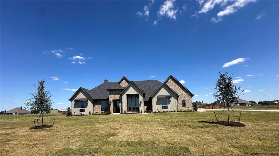 Front exterior of a new home in , Dish, TX, highlighting curb appeal (Image 18).