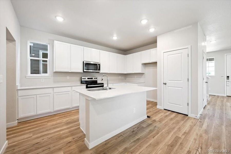 Furnished interior view inside a new home in The Boulevard II Collection at Windler, Aurora (Image 7).