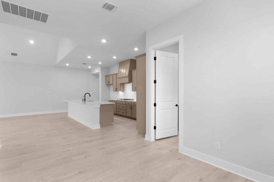 Furnished interior view inside a new home in The Grove at Blackhawk, Pflugerville (Image 13).