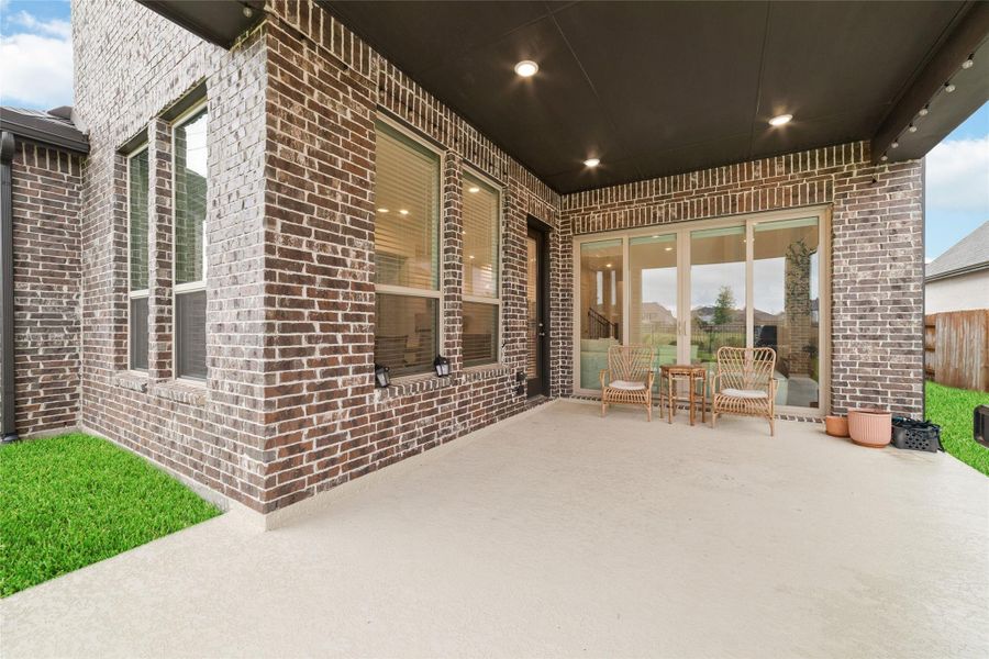 Exterior details and patio area of a home in Elyson, Katy (Image 26).