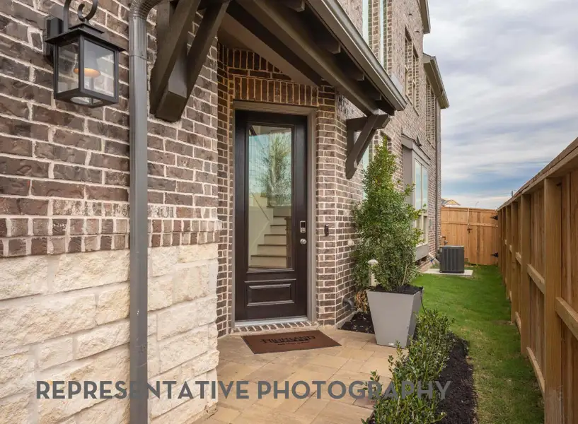 Exterior details and patio area of a home in Bridgeland Central, Cypress (Image 3).