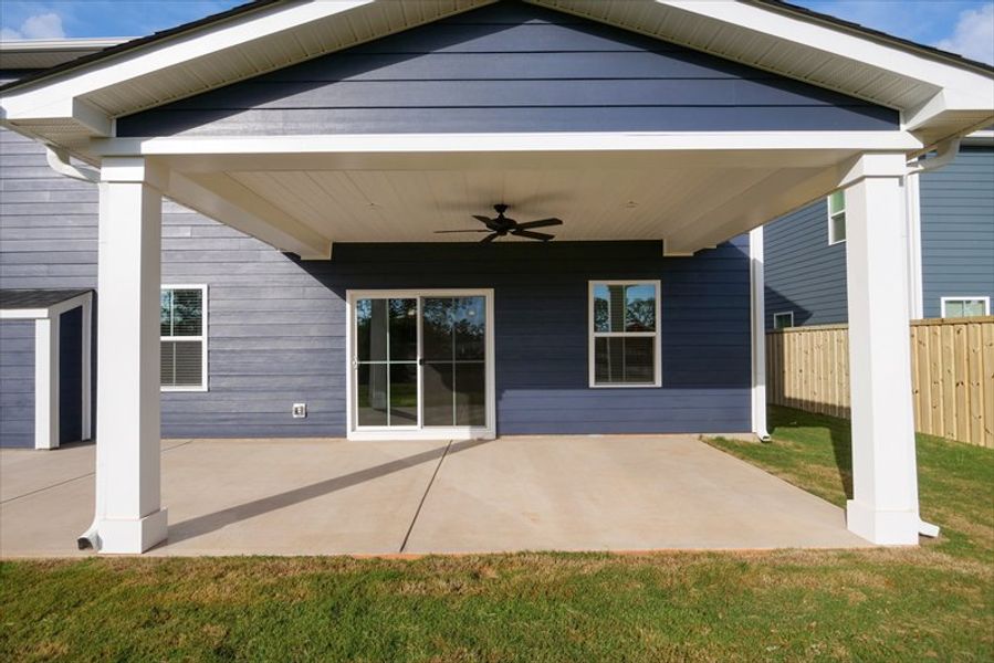 Exterior details and patio area of a home in Canterbrook Farms 2-Story, Fountain Inn (Image 18).