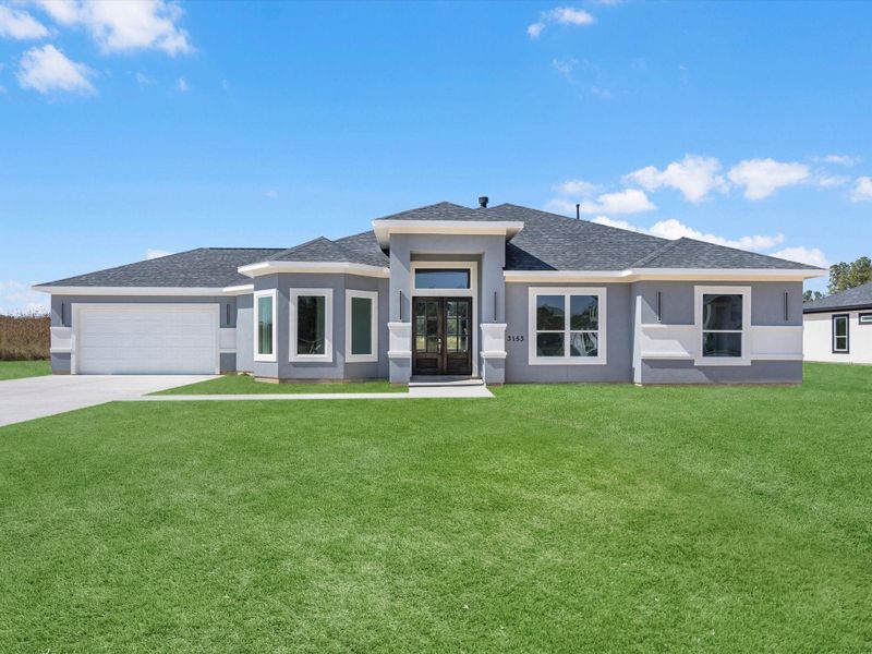 Front exterior of a new home in , Dayton, TX, highlighting curb appeal (Image 2). Front exterior of a new home in , Dayton, TX, highlighting curb appeal (Image 2).