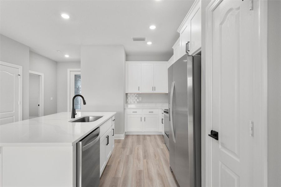 Furnished interior view inside a new home in Celebration Pointe, Fort Pierce (Image 3).