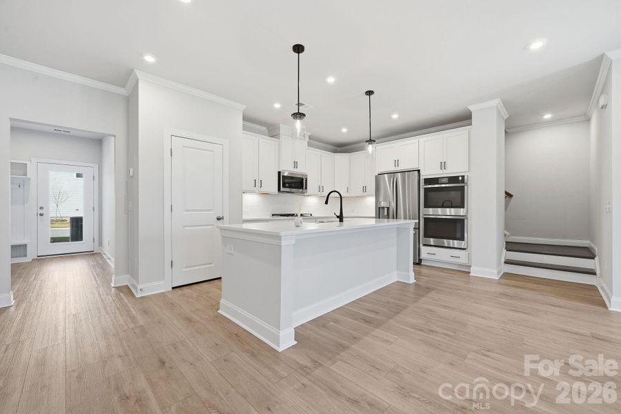 Example Photo Example Photo