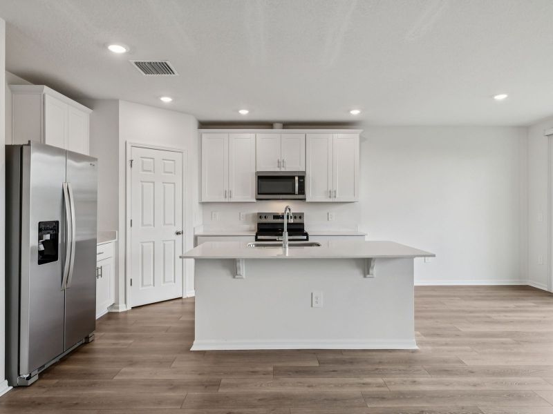 Furnished interior view inside a new home in Crosswinds - Signature Series, Haines City (Image 3).